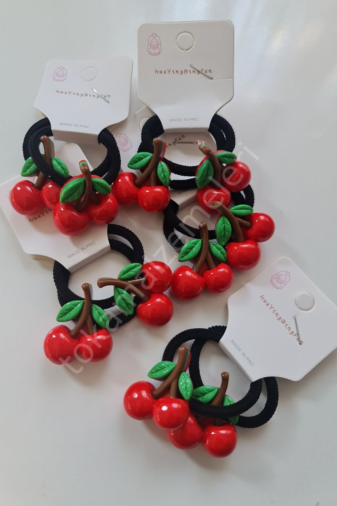 Kirazlı lastik tokalar